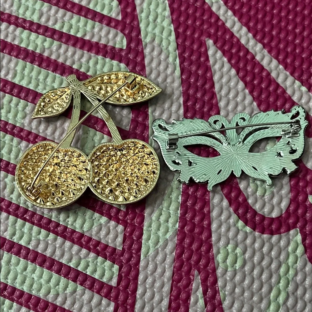 Elegant Cherry and Mask Brooch Set - Picture 3 of 3